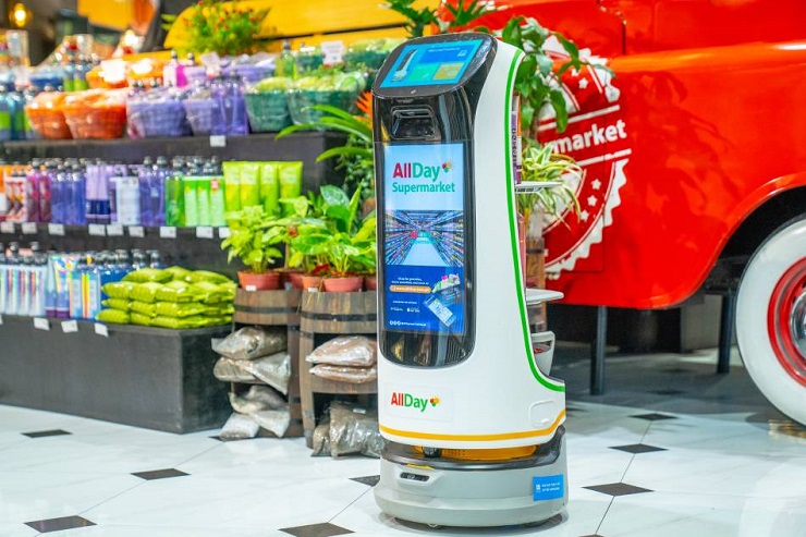 All day shop. Робот в супермаркете. Ритейлеры. Робот промоутер. Супермаркет Филиппин фото.